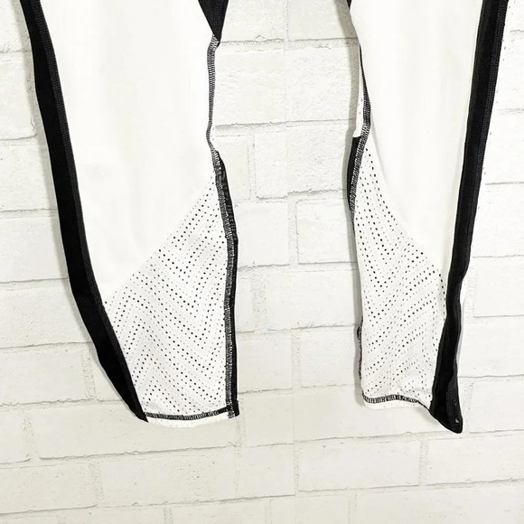 Athleta Black and White Cropped Leggings with Laser Cut Details Women's Small - Picture 3 of 7